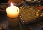 57-a-lone-candle-marks-the-xmas-dinner-vigil.jpg